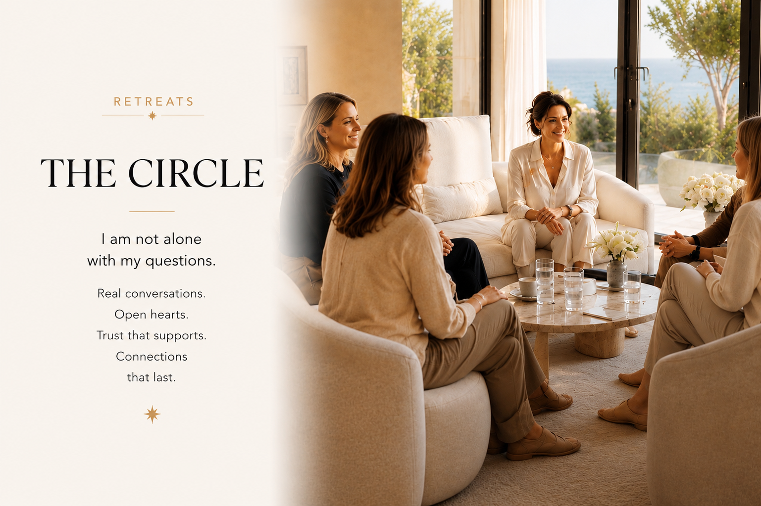 A small group of women sits together in a bright living space overlooking the sea, engaged in an open and thoughtful conversation. The image represents trust, deep listening, authentic connection, personal growth and the supportive community of a SHEJA Retreat.